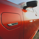 A close up photo of the BMW Electrified logo at the front of the 330e Sedan.